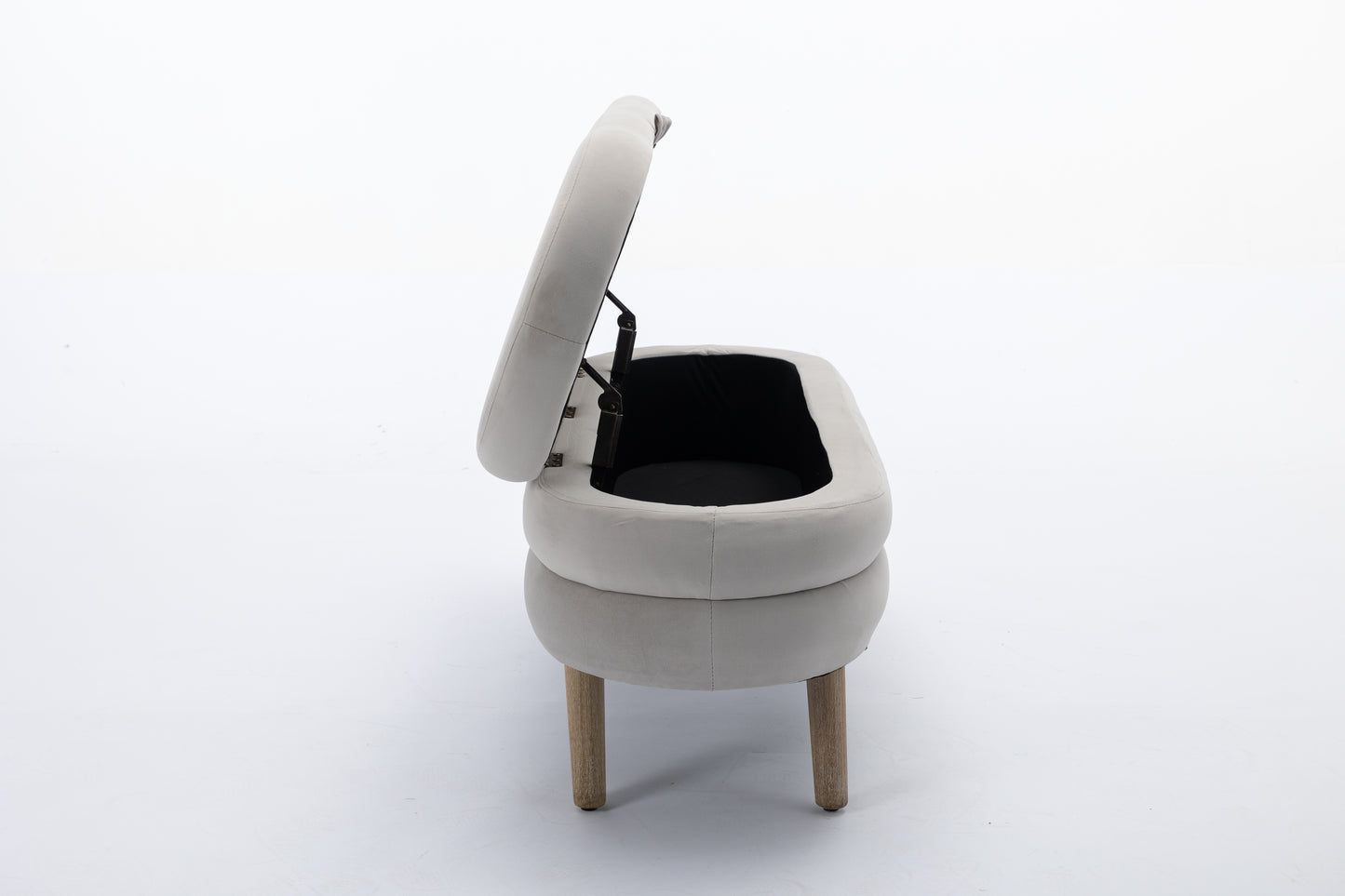 Light grey velvet storage bench with opened lid