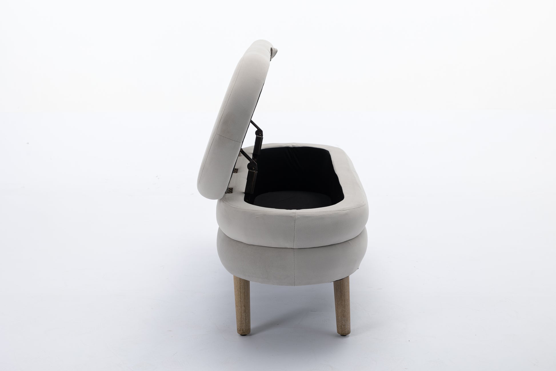 Light grey velvet storage bench with opened lid