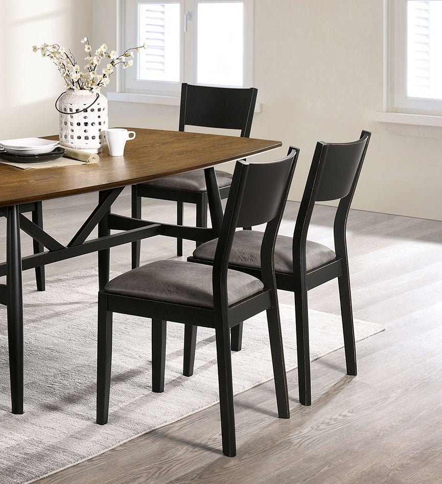 Black dining chairs with grey upholstered seats