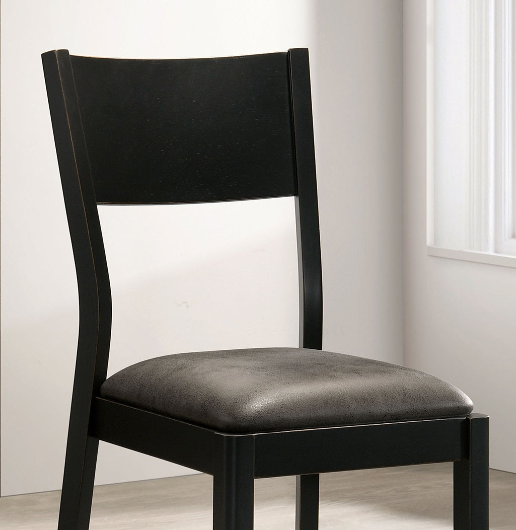 Black wooden dining chair with a gray upholstered seat