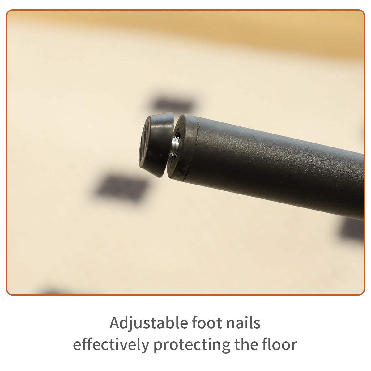 Closeup of a black adjustable foot nail with a protective rubber cap screwed into a furniture leg
