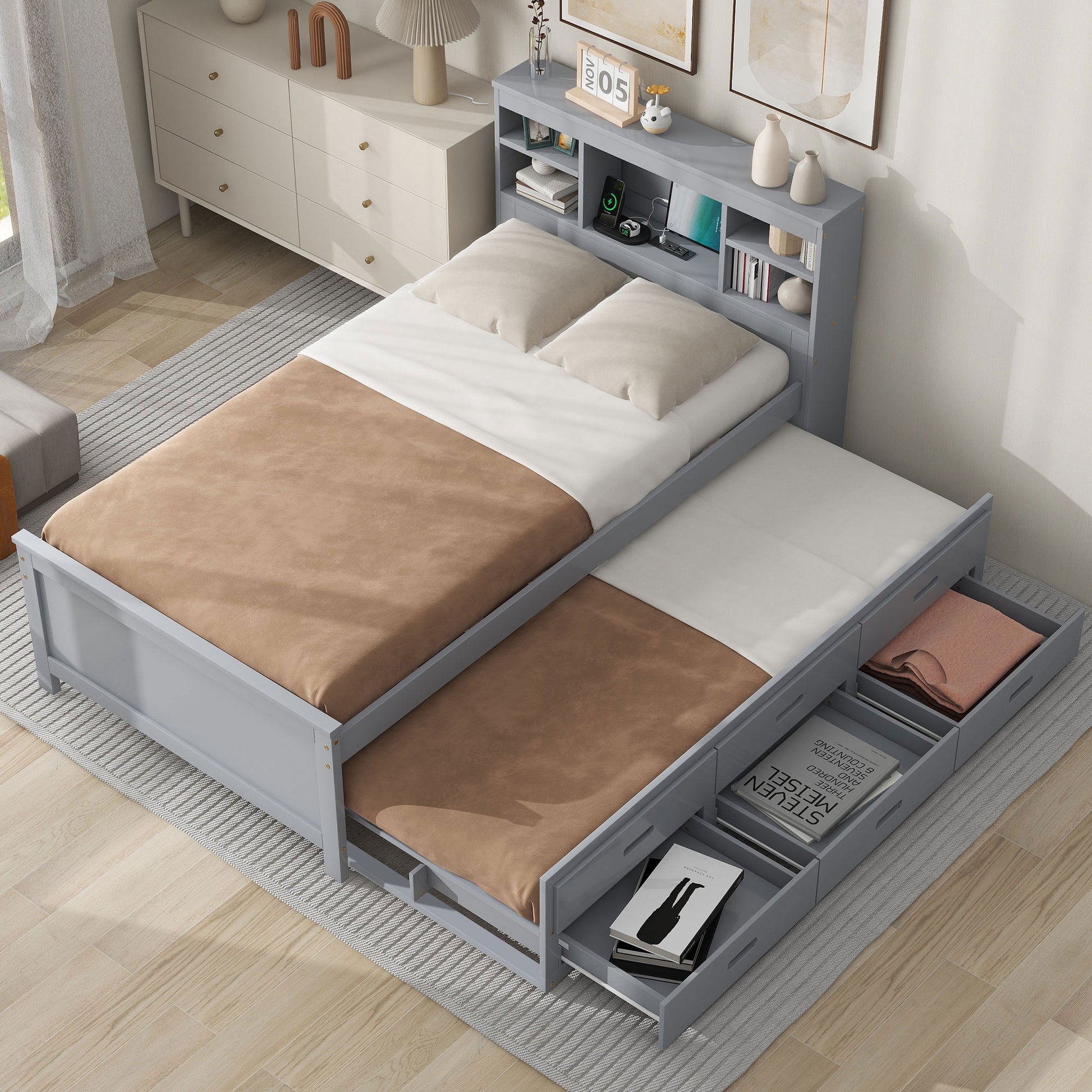 Gray wood twin daybed with pullout trundle and storage drawers