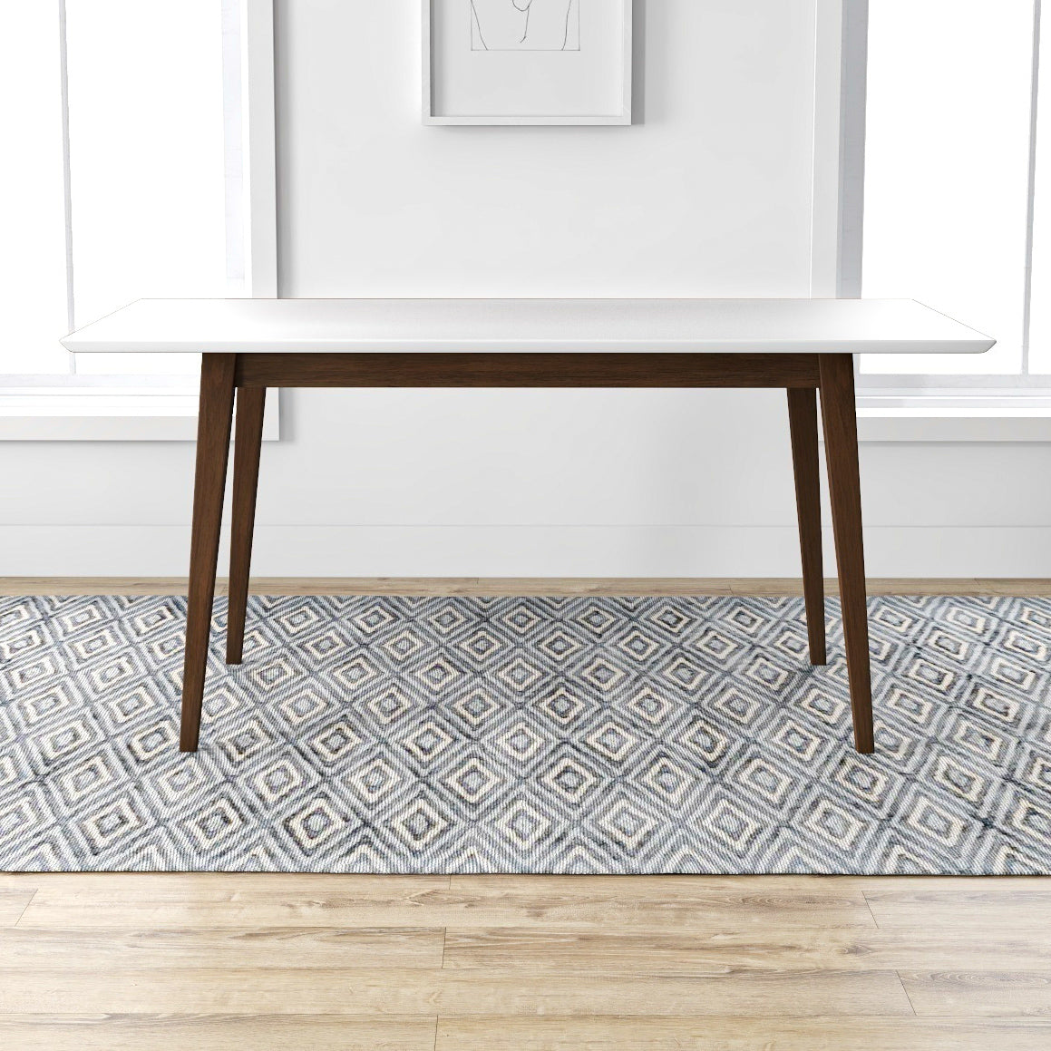 White modern dining table with dark wood tapered legs