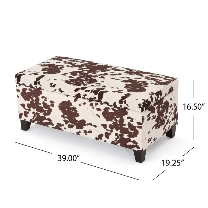 Cow print storage ottoman with dark wood legs