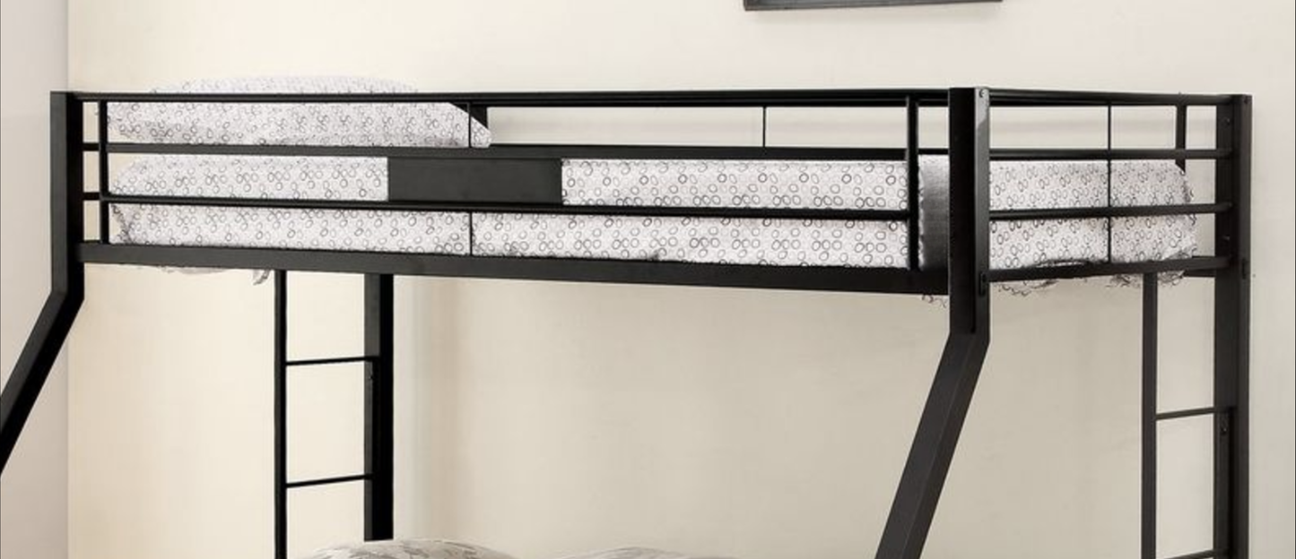 Black metal twin over twin bunk bed with patterned bedding