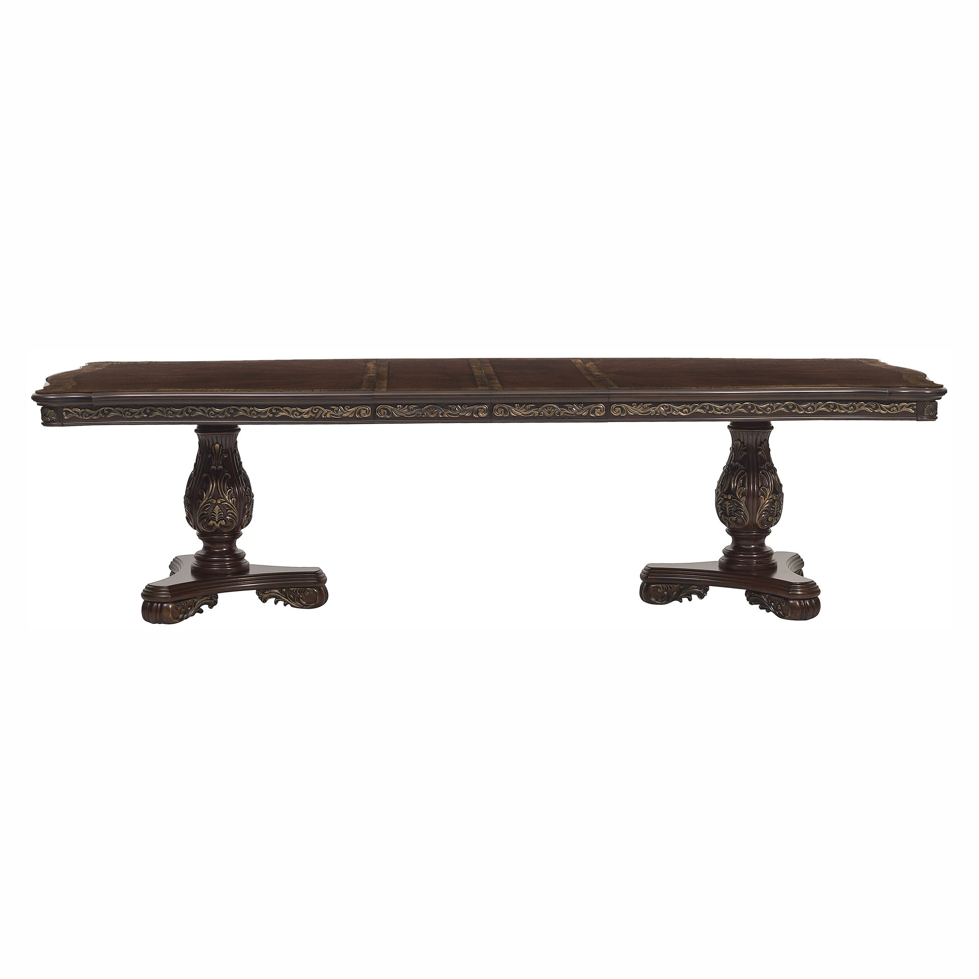 Dark wood dining table with ornate carved pedestal legs