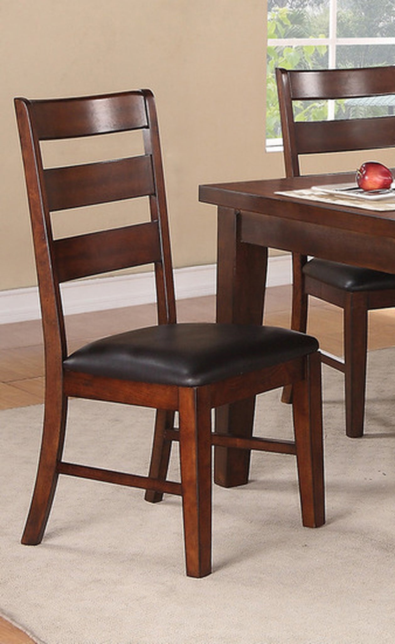 Dark brown ladderback dining chair with black leather seat