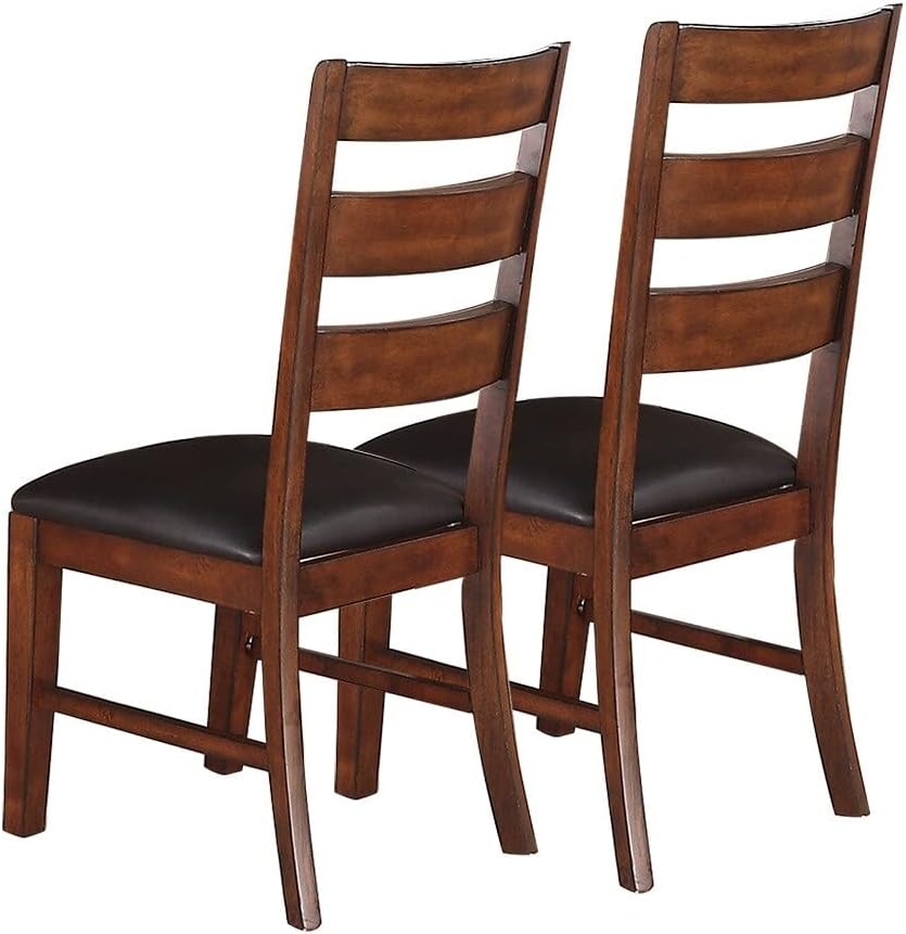 Two dark brown wooden dining chairs with slatted backs and padded seats