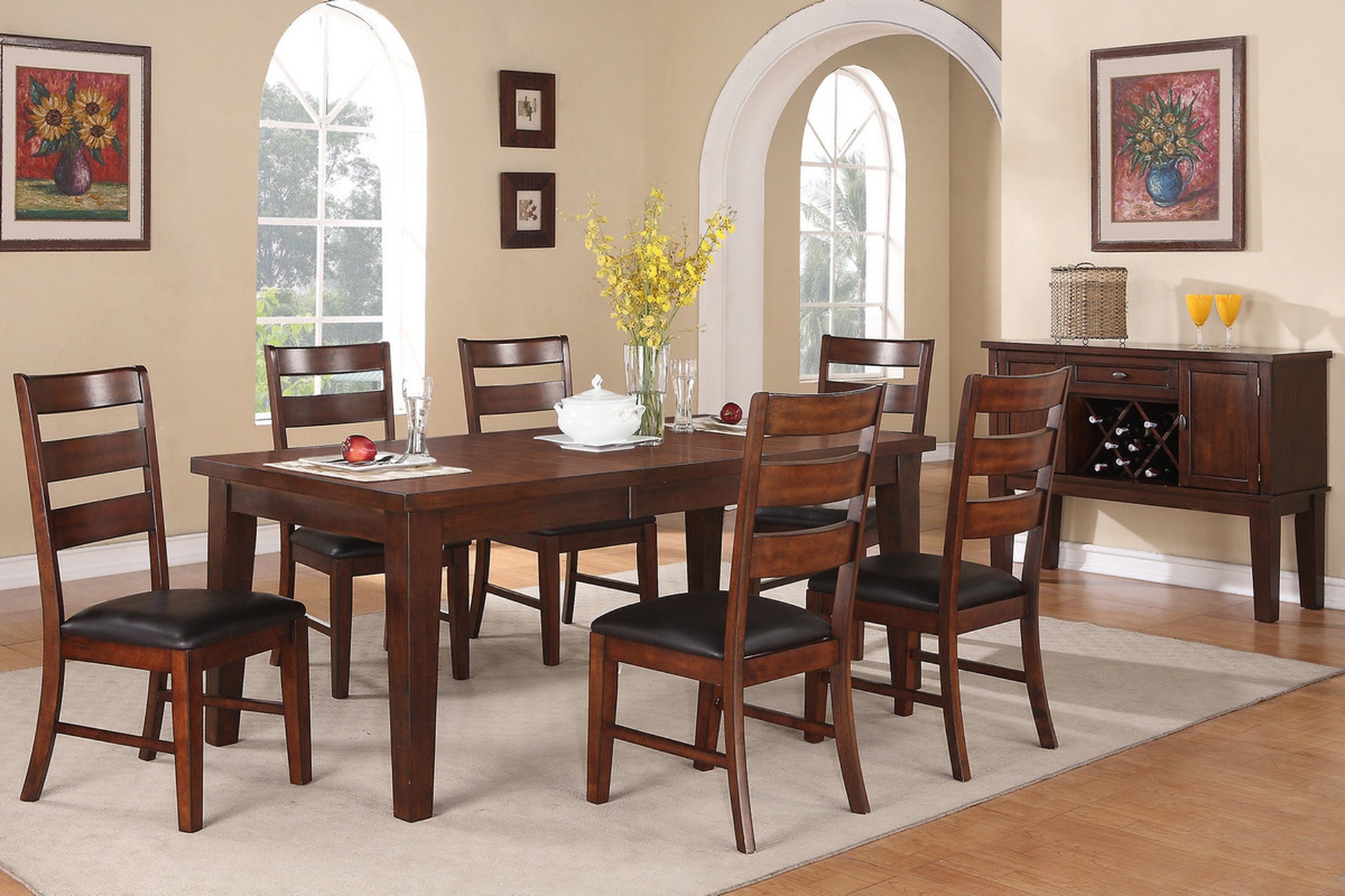 Dark wood dining table with upholstered chairs and wine cabinet