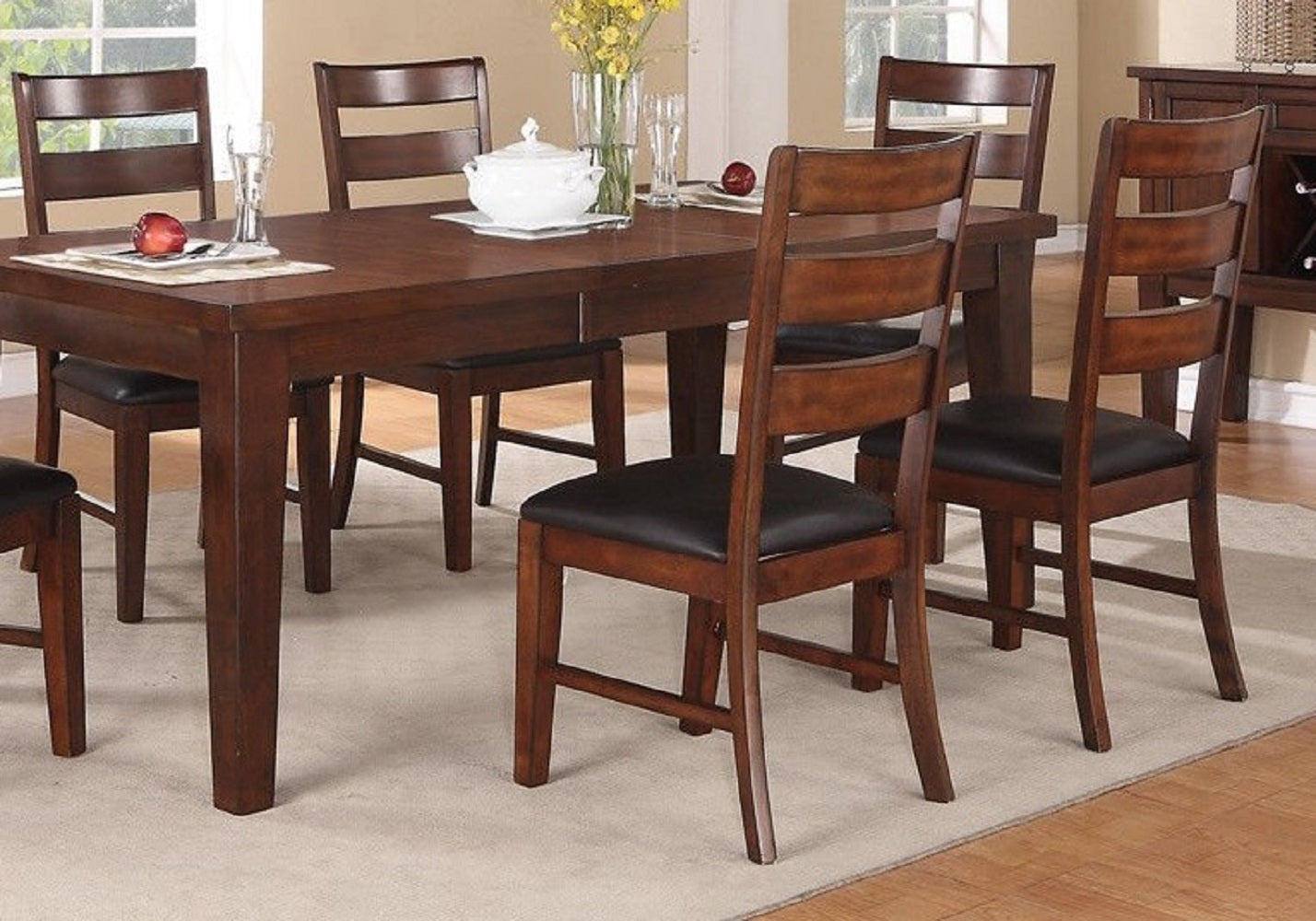 Rich brown wood dining set with upholstered black seats