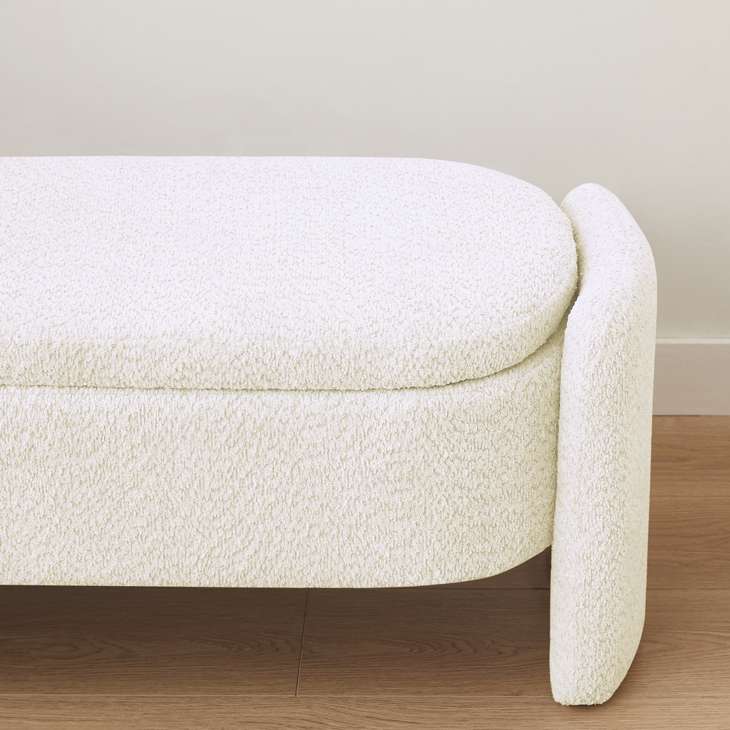 Cream boucle storage bench with curved sides and lifttop