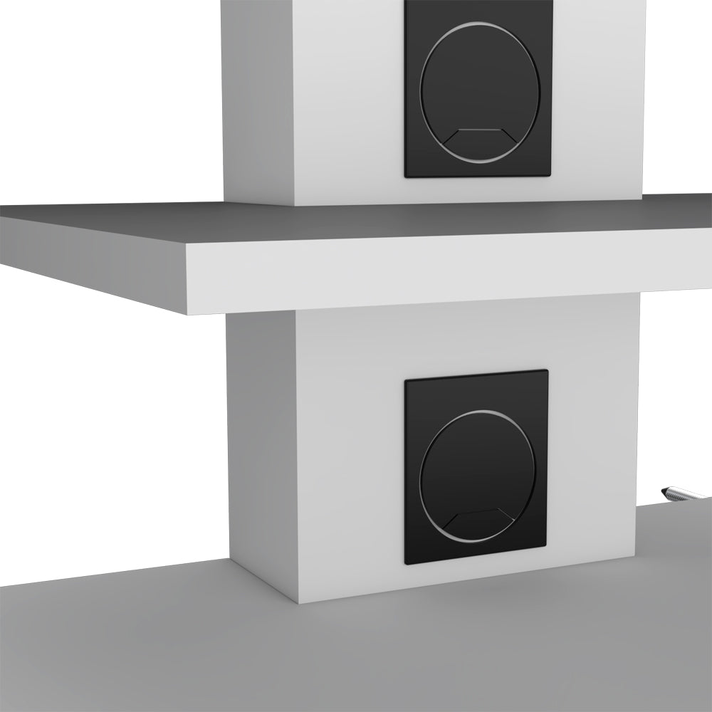 Black recessed desk grommet on a white surface