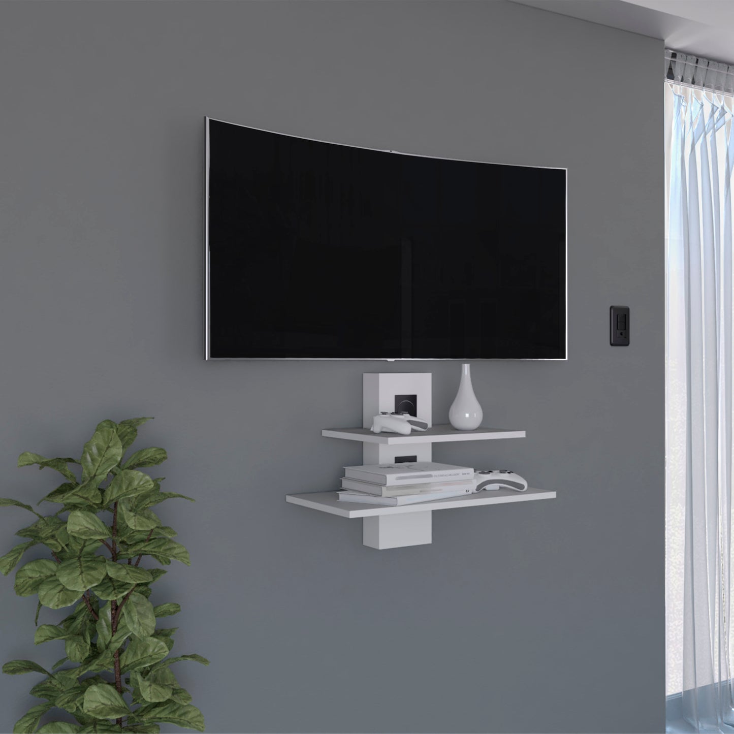 White floating tv shelf holding video game controllers and books