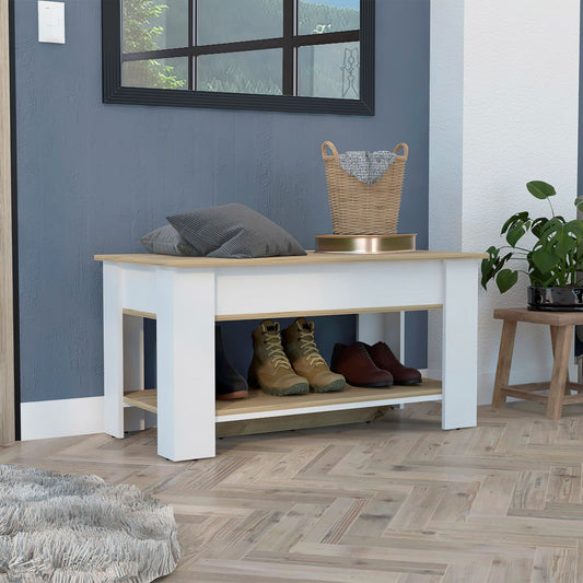 White and oak shoe bench with two shelves holding boots and dress shoes