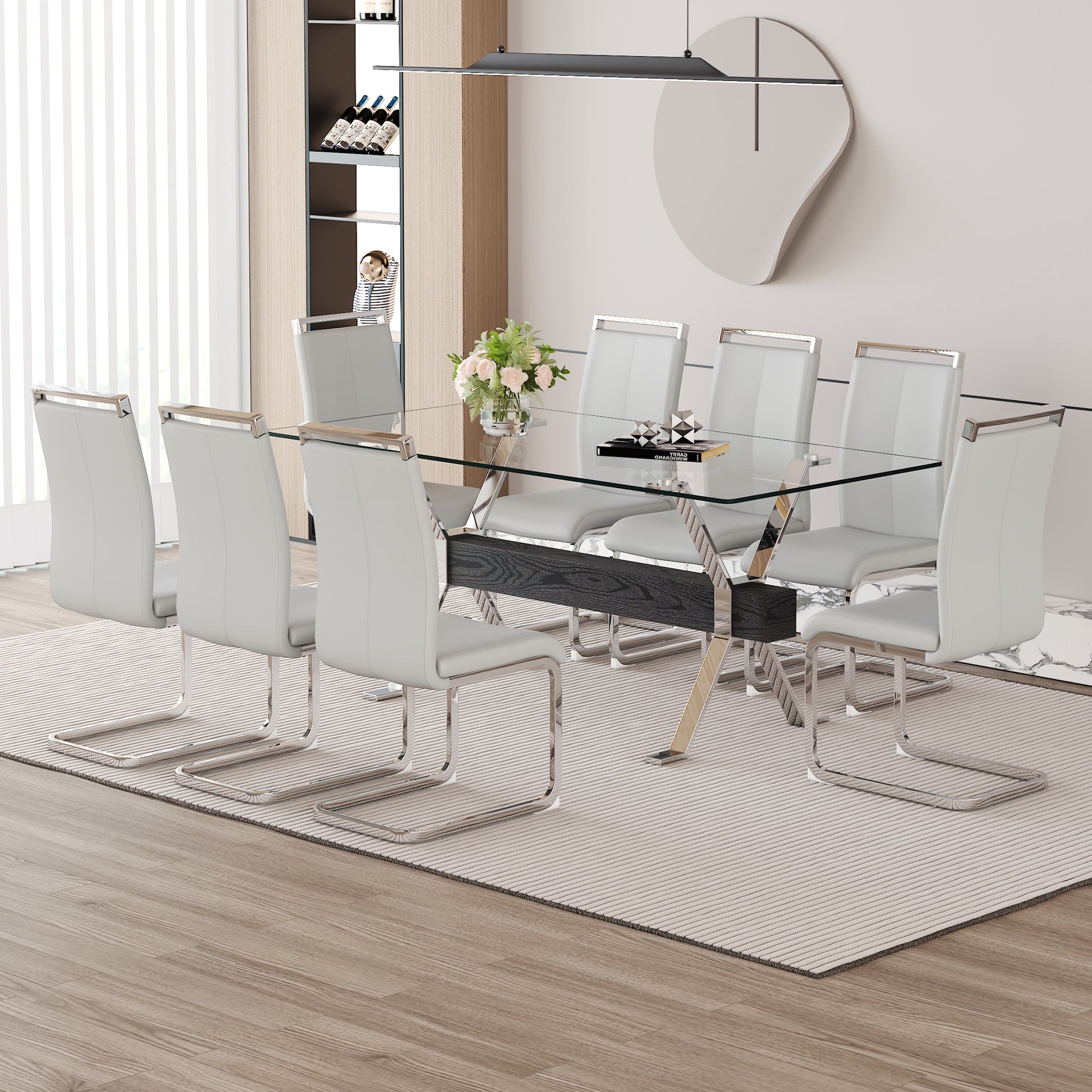 Modern glass top dining table with eight white faux leather chairs