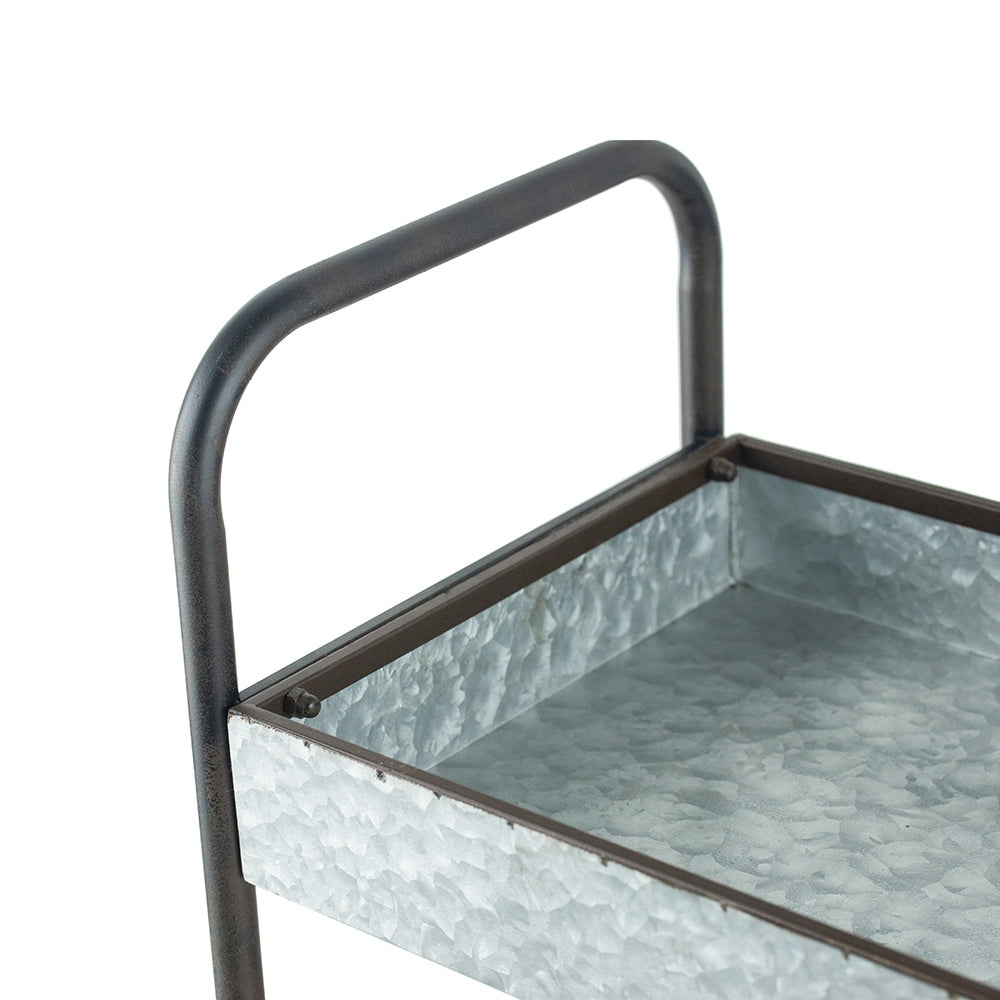 Galvanized metal utility cart with dark metal frame and handle