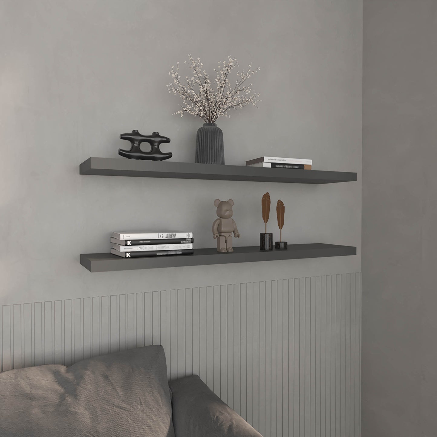 Gray floating shelf with modern black sculpture and floral vase