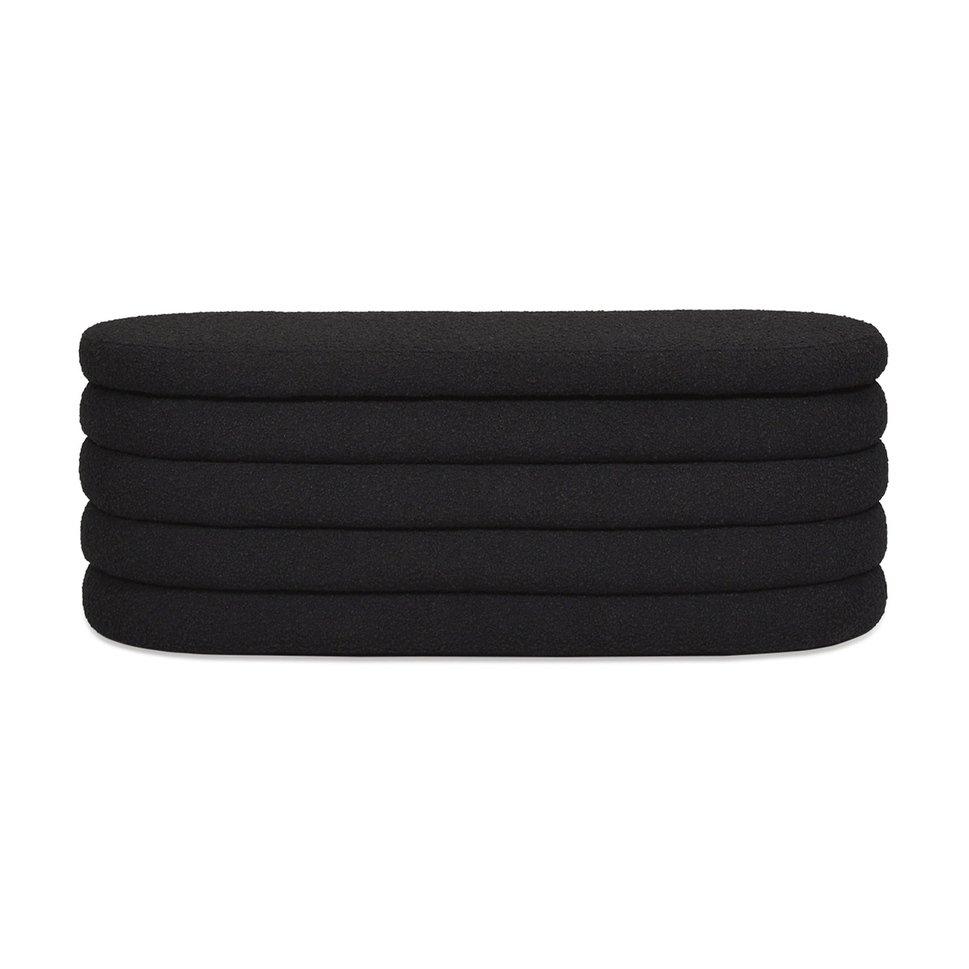 Stack of five black textured yoga bolster cushions