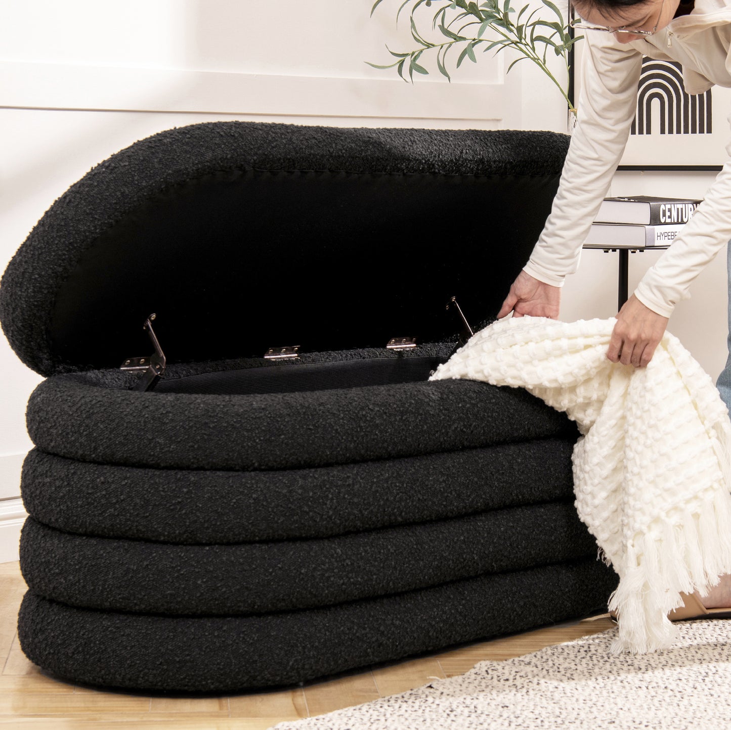 Black boucl storage bench with hidden compartment