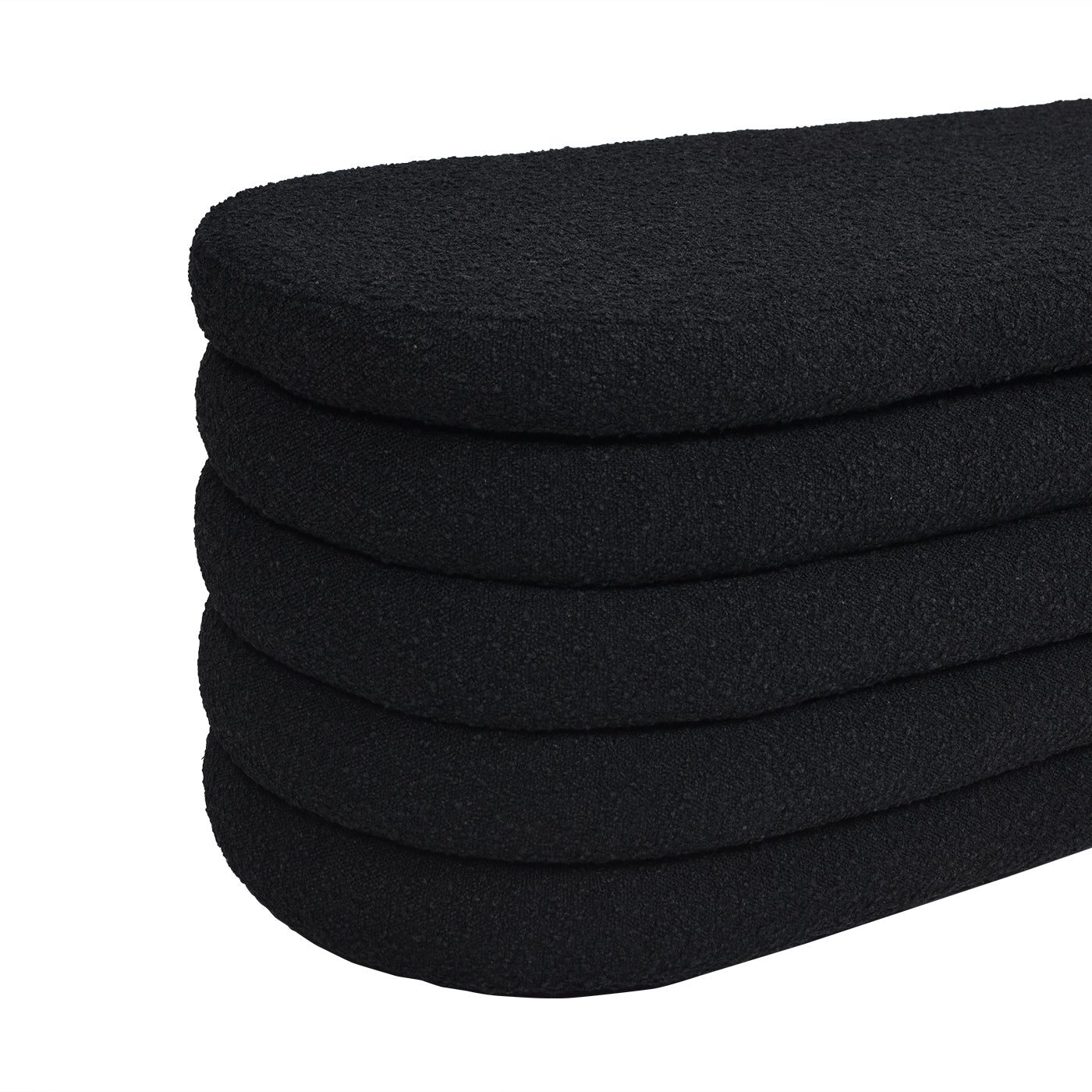 Stack of five textured black orthopedic shoe insoles