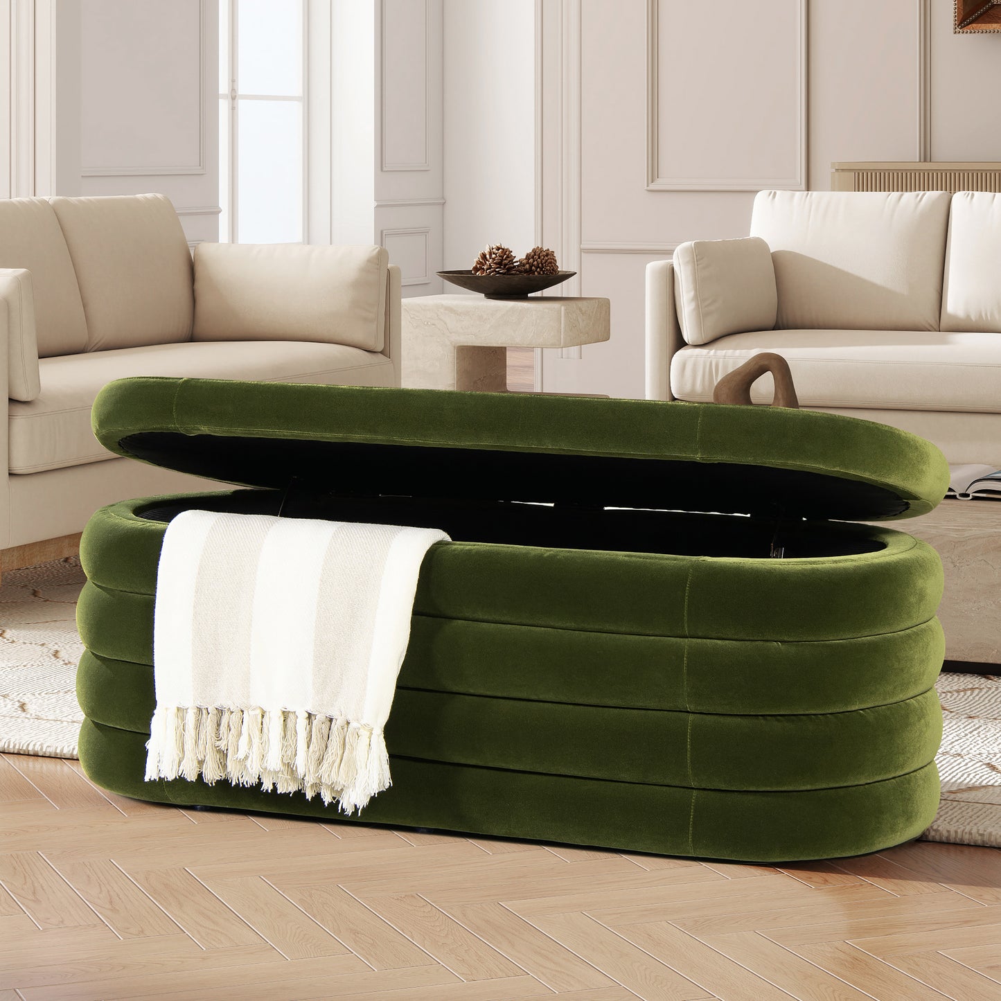 Plush green storage ottoman with horizontal tufting and open lid