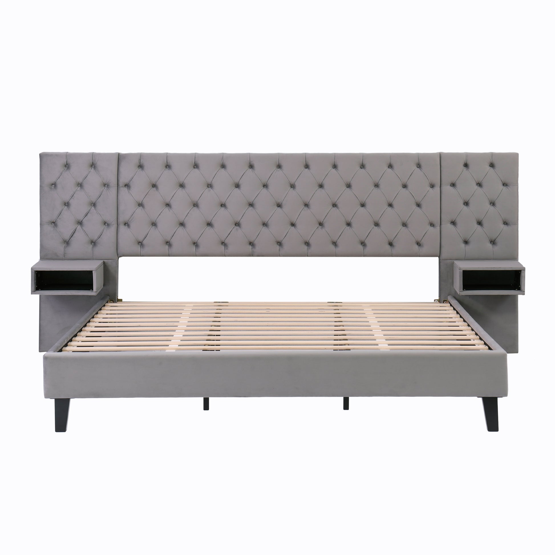Grey velvet platform bed with tufted headboard and builtin nightstands