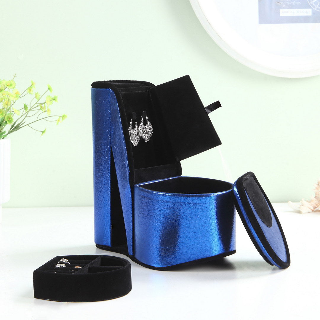 Blue metallic highheel shoe shaped jewelry box with silver earrings
