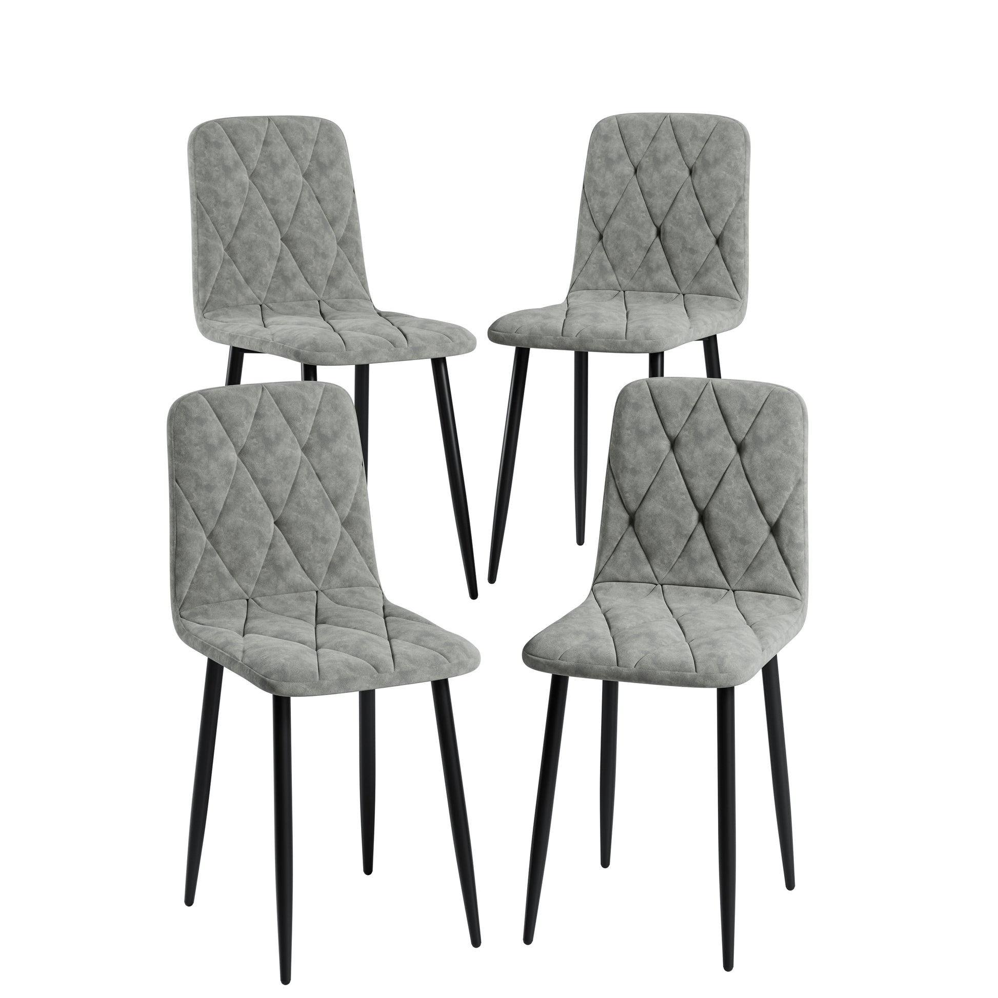 Four grey upholstered dining chairs with diamond tufting and black metal legs