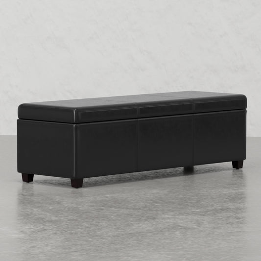 Black faux leather storage ottoman with stitching details