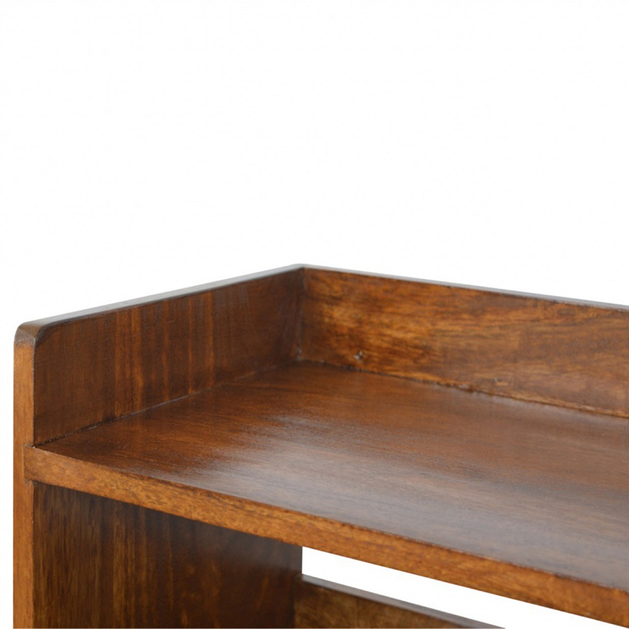 Closeup of a rich brown wooden shelf with a smooth polished finish