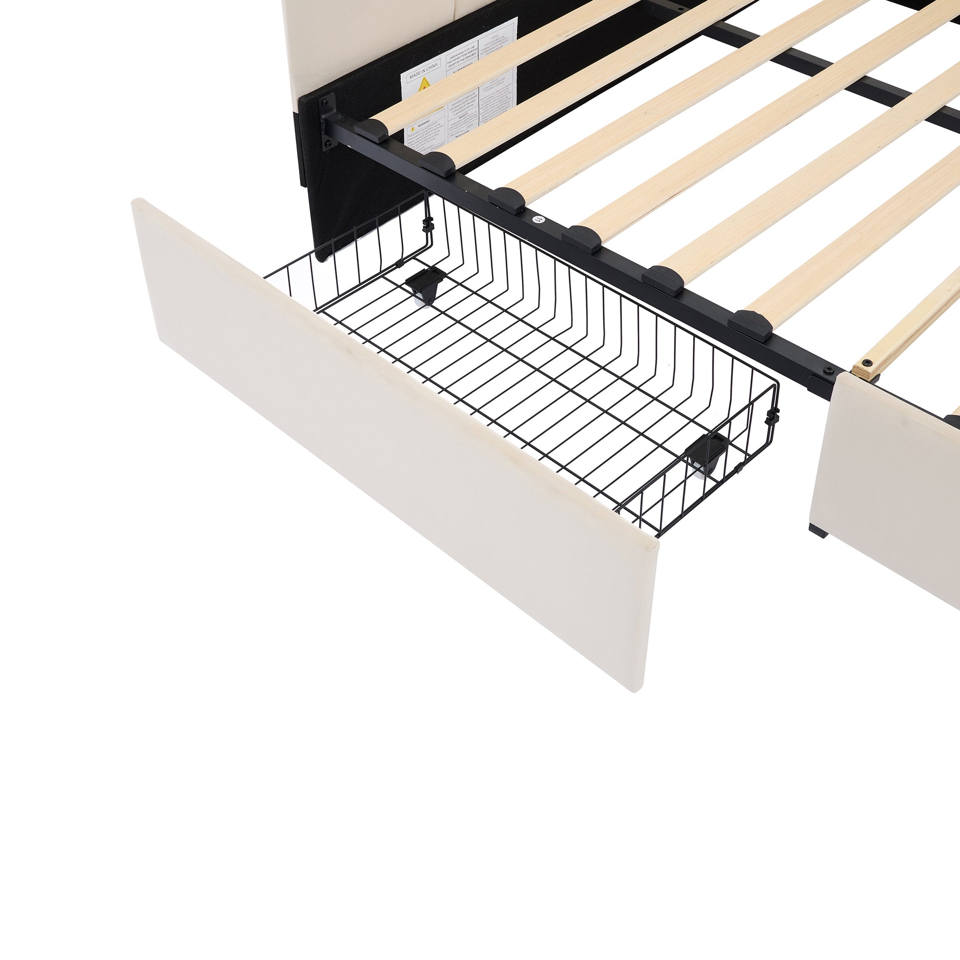 Beige upholstered bed frame with pullout storage drawer and wooden slats
