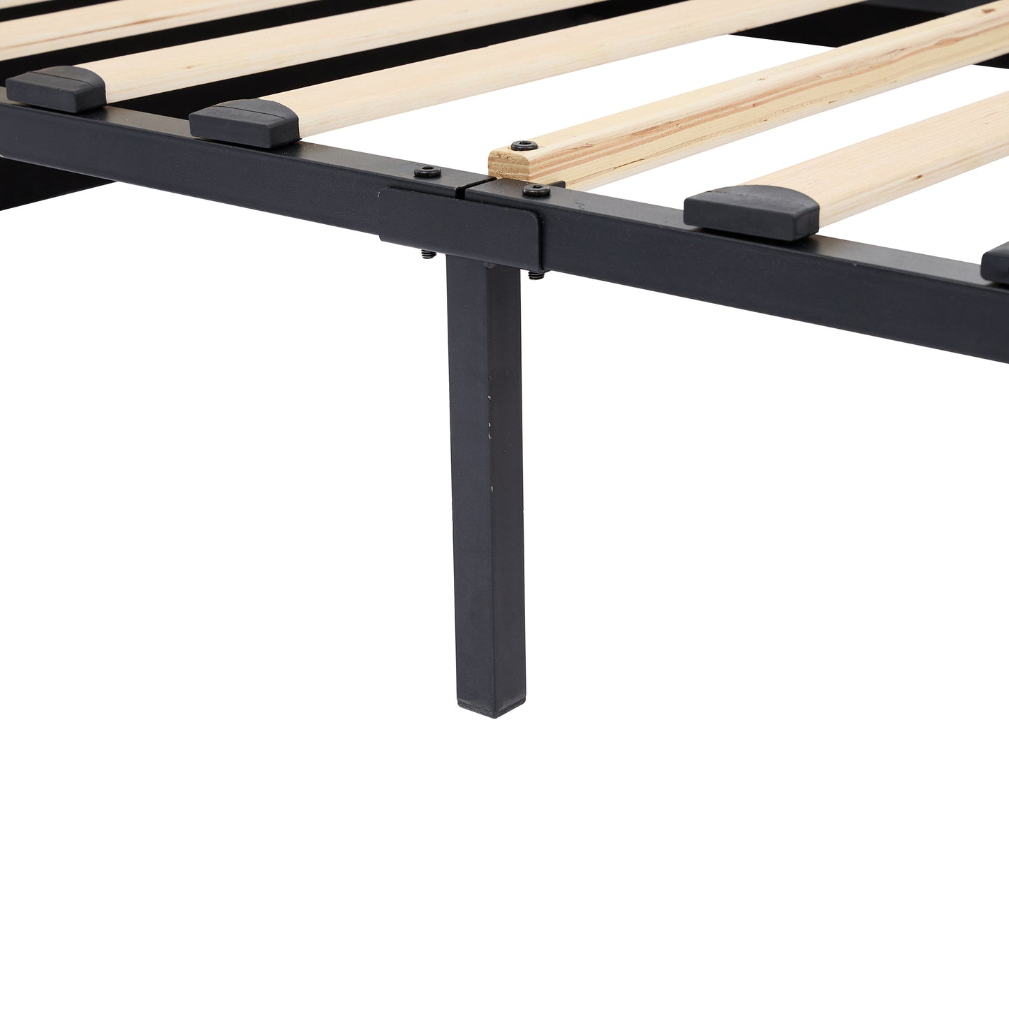 Closeup of black metal bed frame with wooden slats and black protective caps