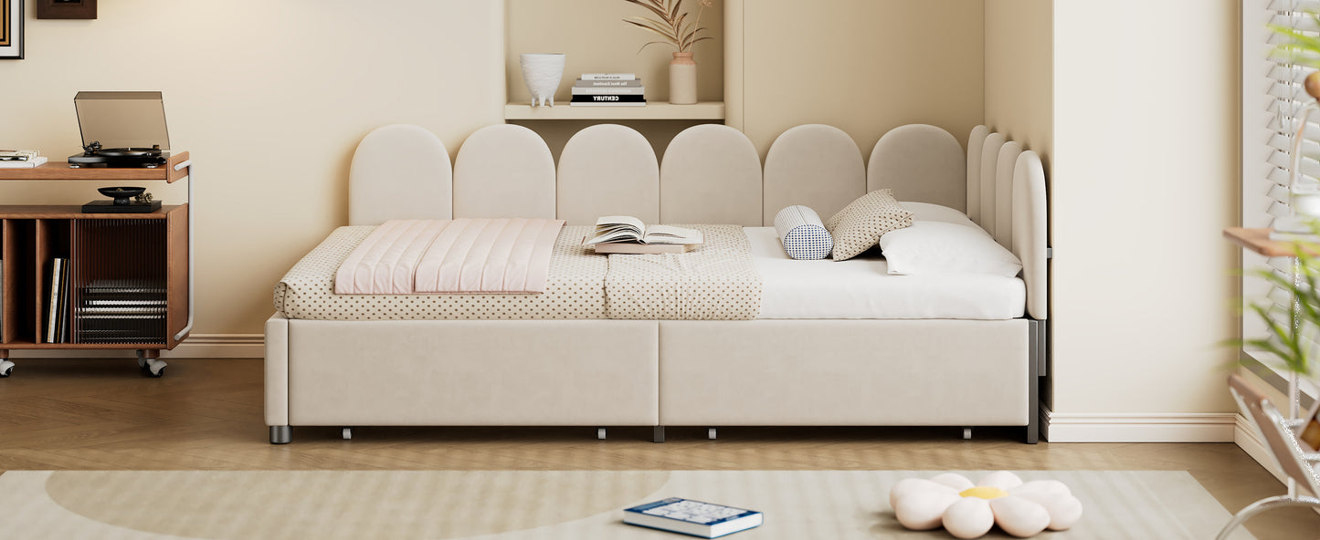 Cream velvet daybed with arched headboard and pink quilted throw
