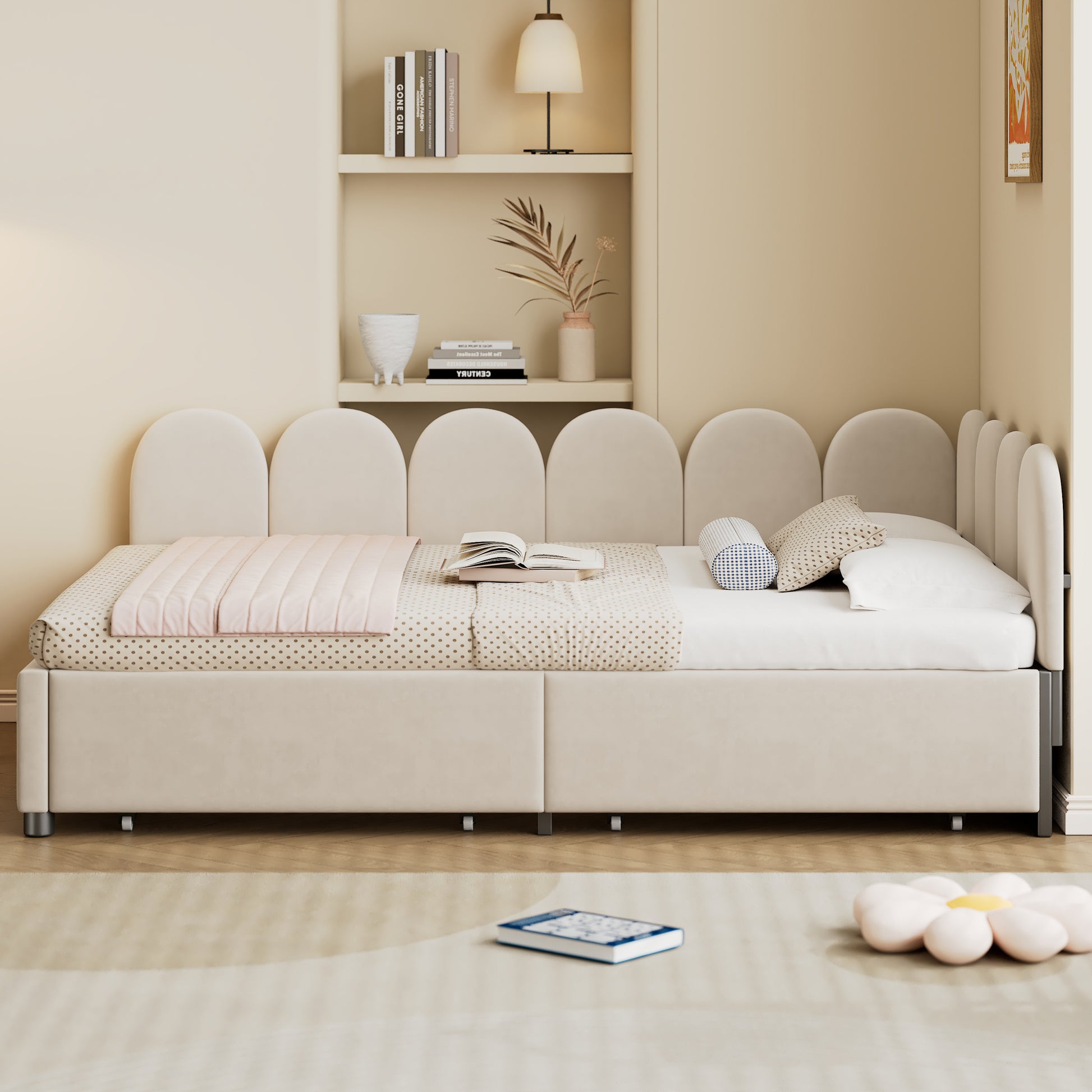Cream velvet arched headboard daybed with polka dot bedding and pink quilt