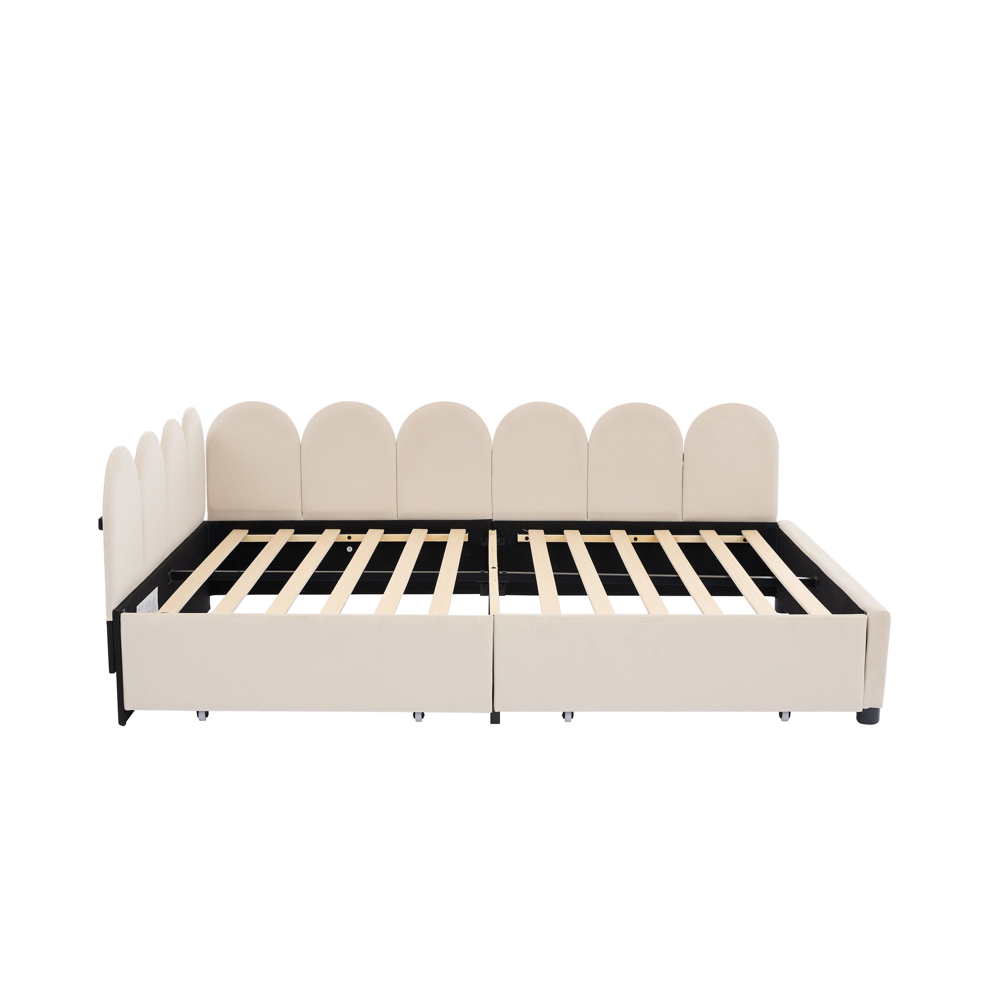 Cream upholstered bed frame with scalloped headboard and wooden slats