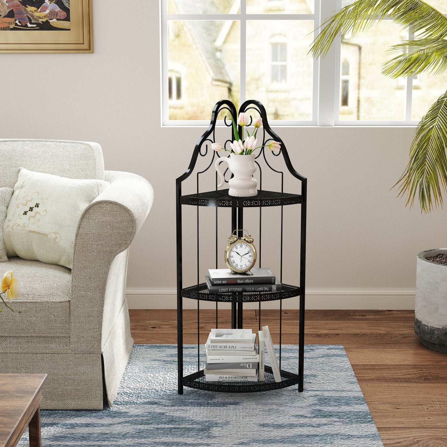 Black wrought iron corner shelf with  tiers and decorative scrollwork