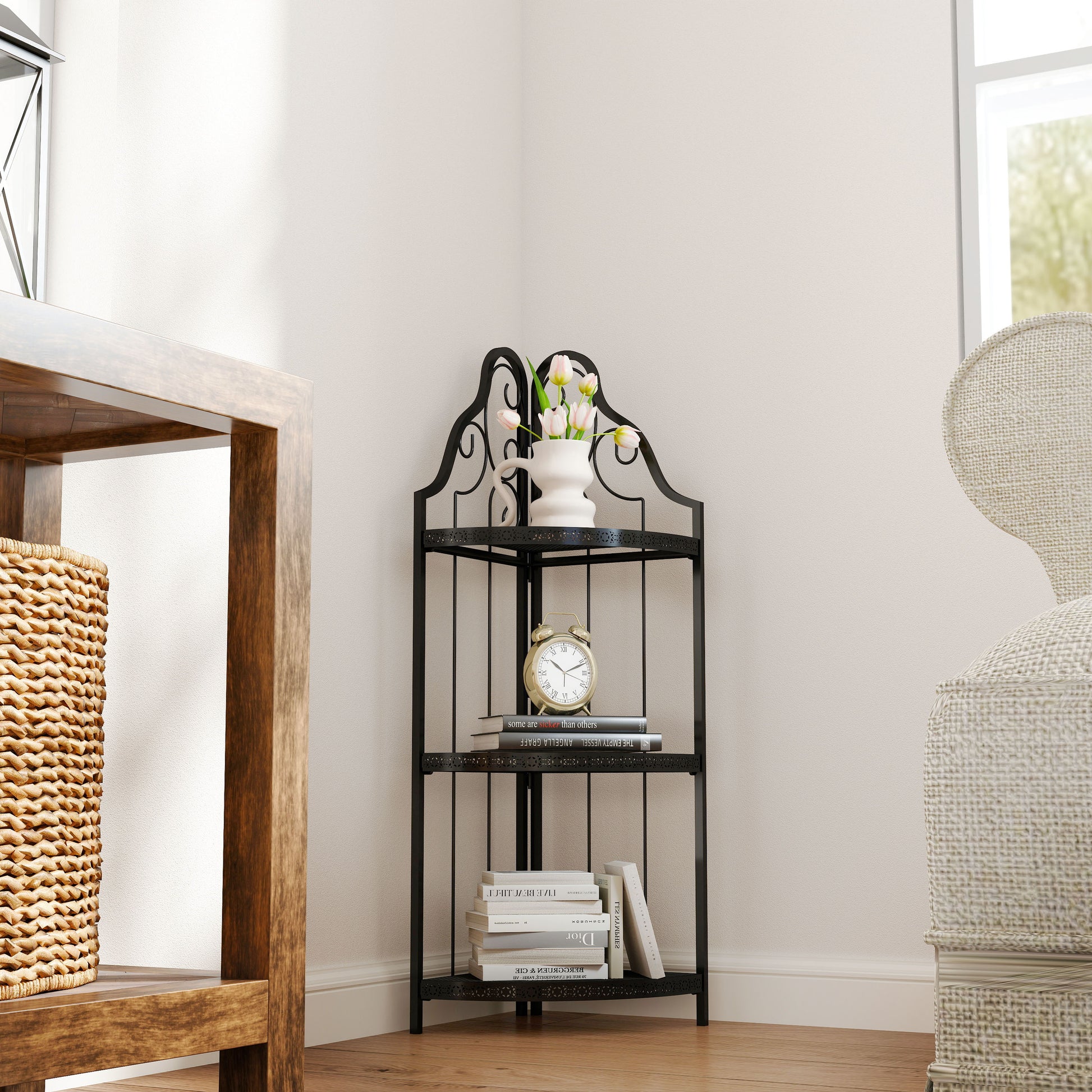 Black metal corner shelf with ornate scrollwork holding books and decor