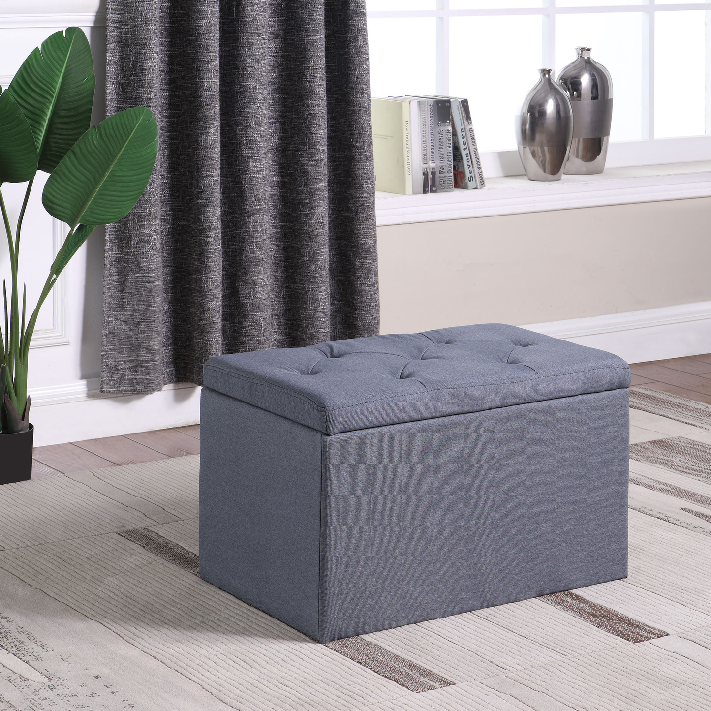 Tufted grey fabric storage ottoman with lifttop lid perfect for living rooms