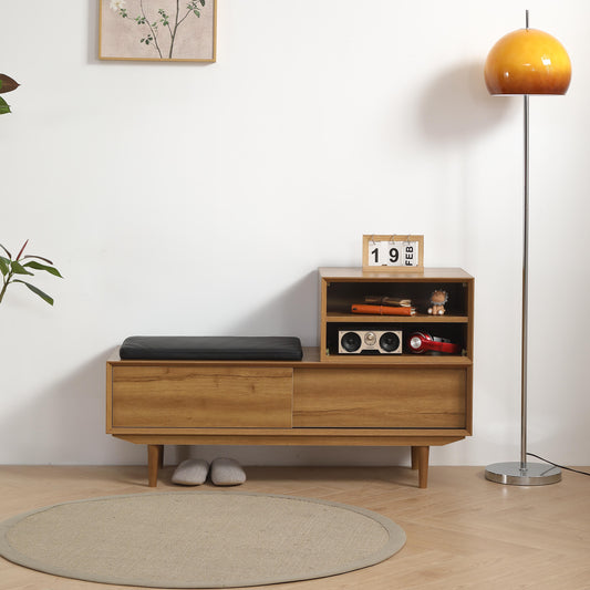 Wooden entryway bench with storage and black cushion