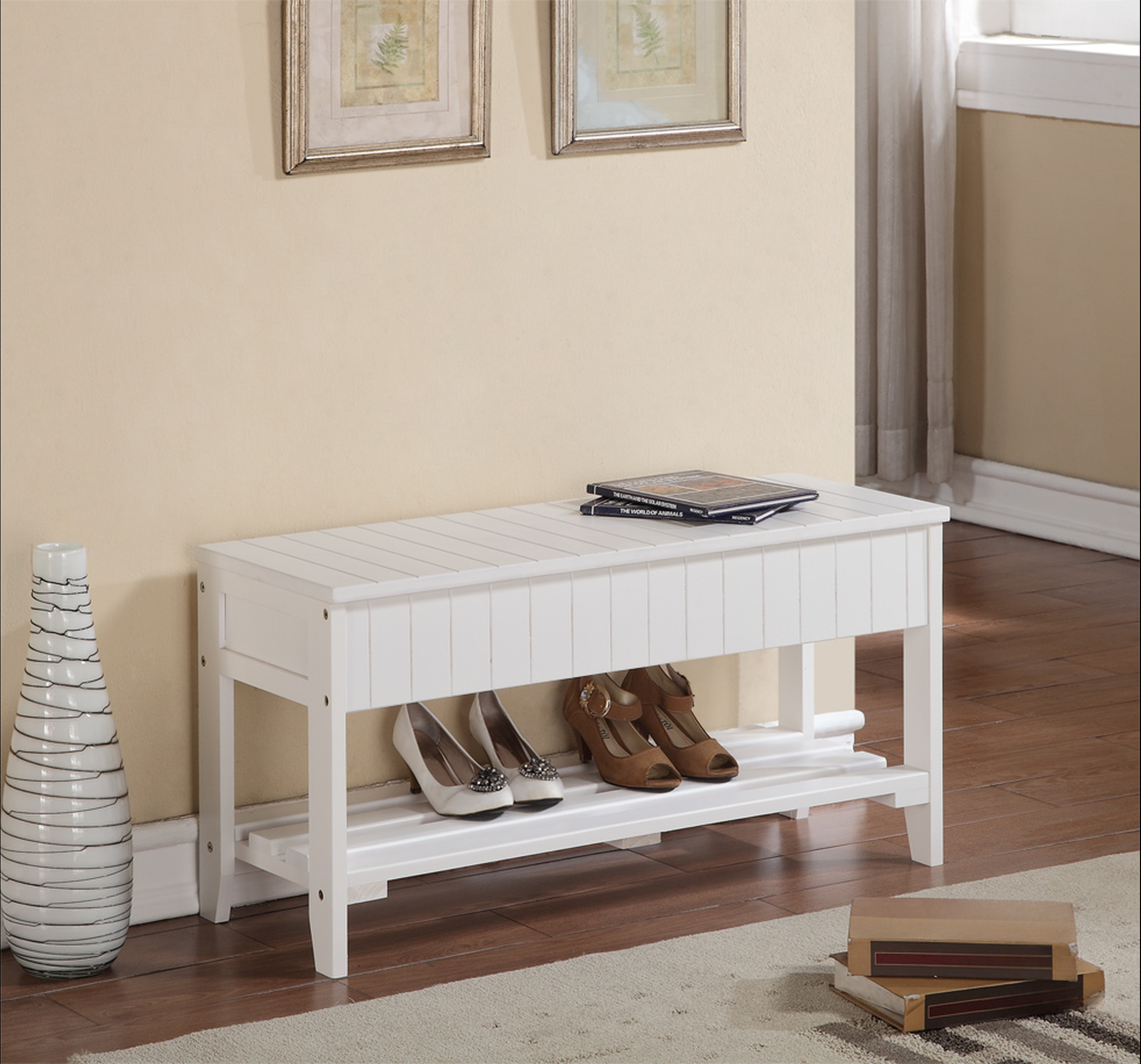 White wooden storage bench with slatted top and two shelves for shoes