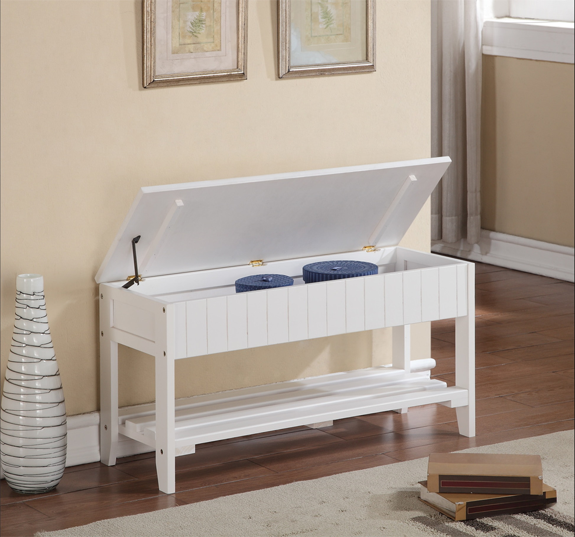 White wooden storage bench with slatted sides and open lid