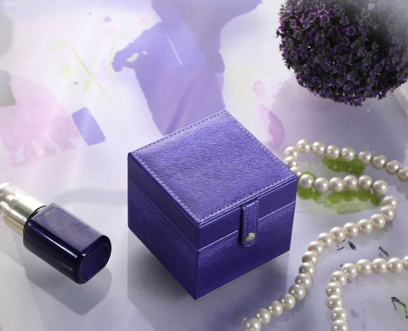 Deep purple textured jewelry box with silver clasp