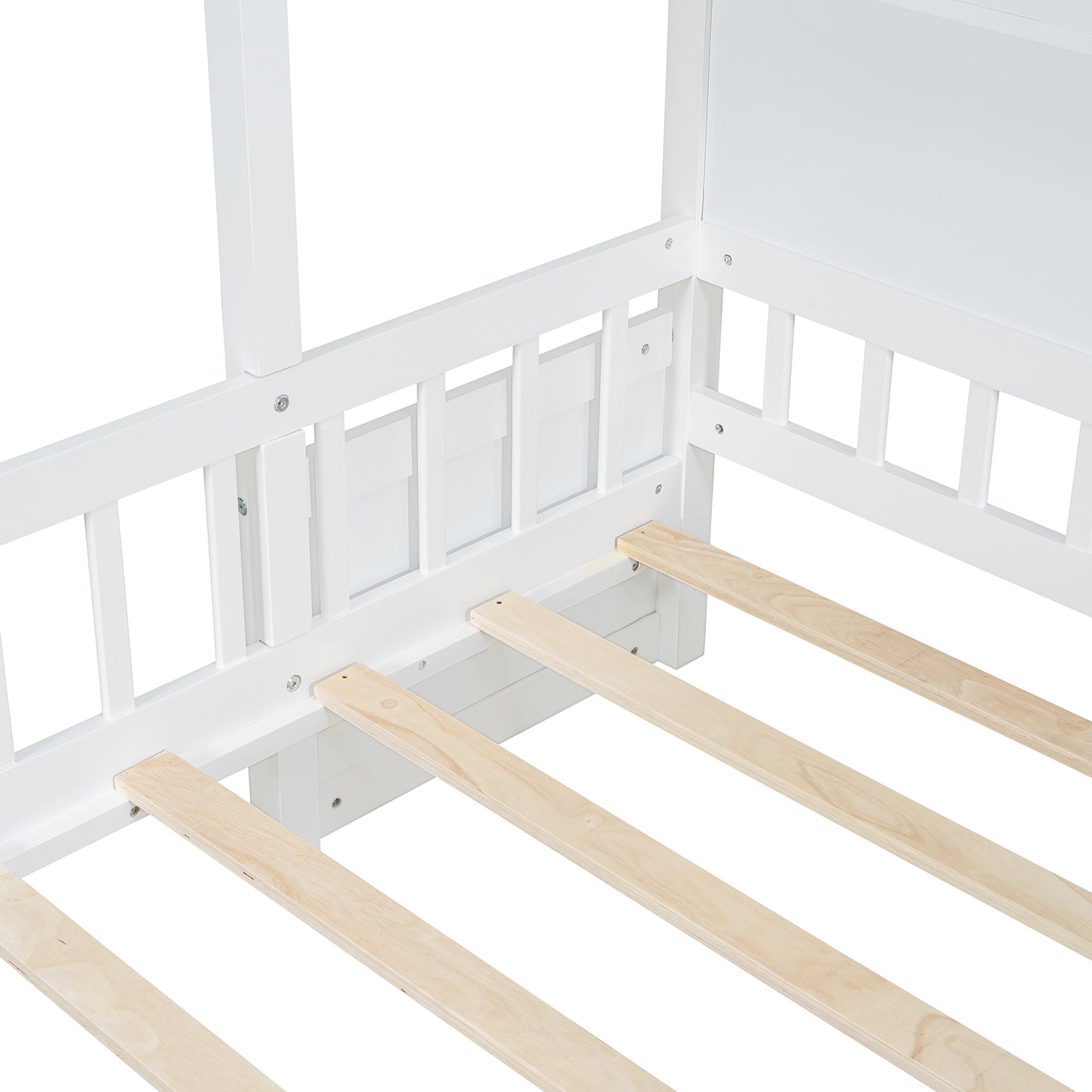White wooden house bed frame detail with slatted base