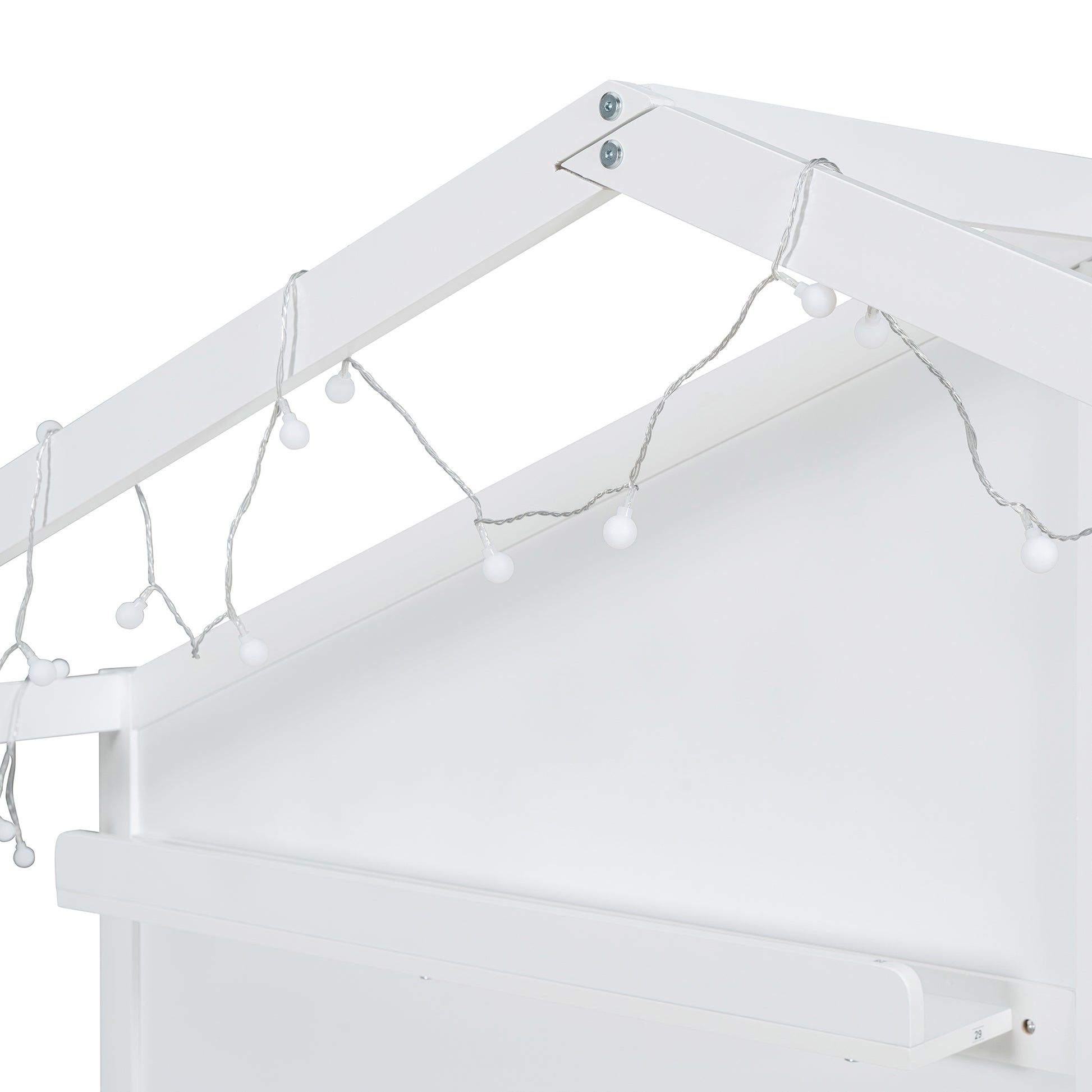 White wooden house bed frame with delicate string lights