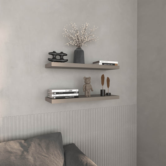 Gray fluted vase with white floral arrangement on modern floating shelf