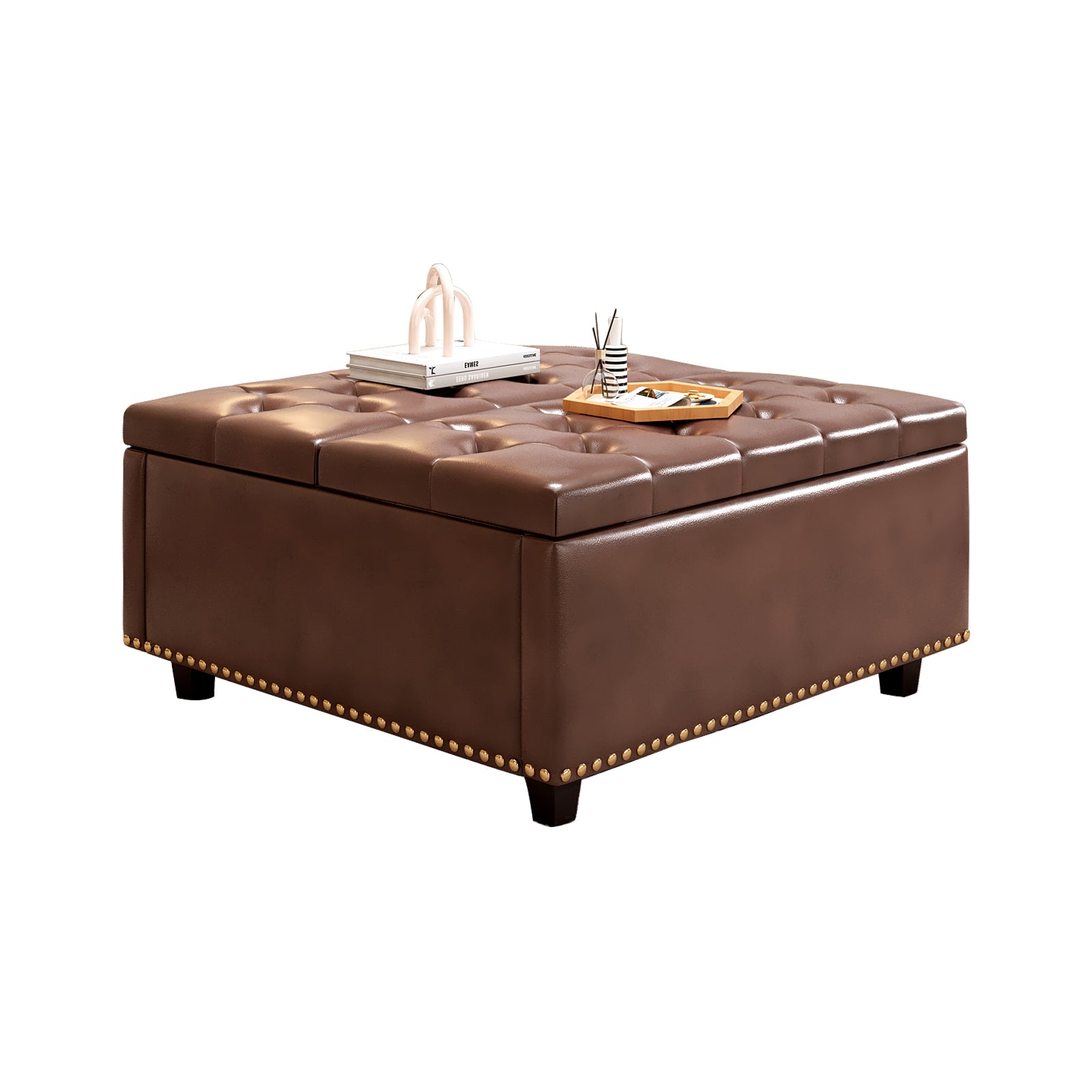 Tufted brown faux leather storage ottoman with gold nailhead trim