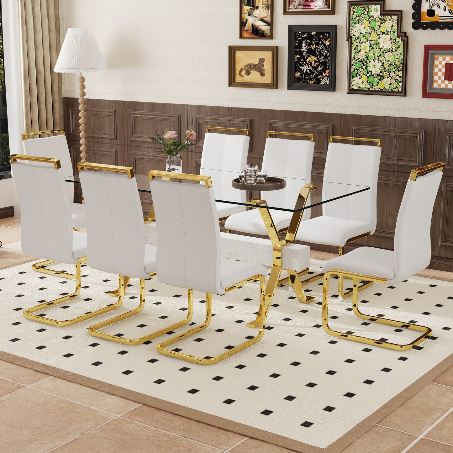 White faux leather dining chairs with gold frames