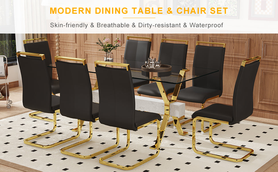 Black faux leather dining chairs with gold metal frames