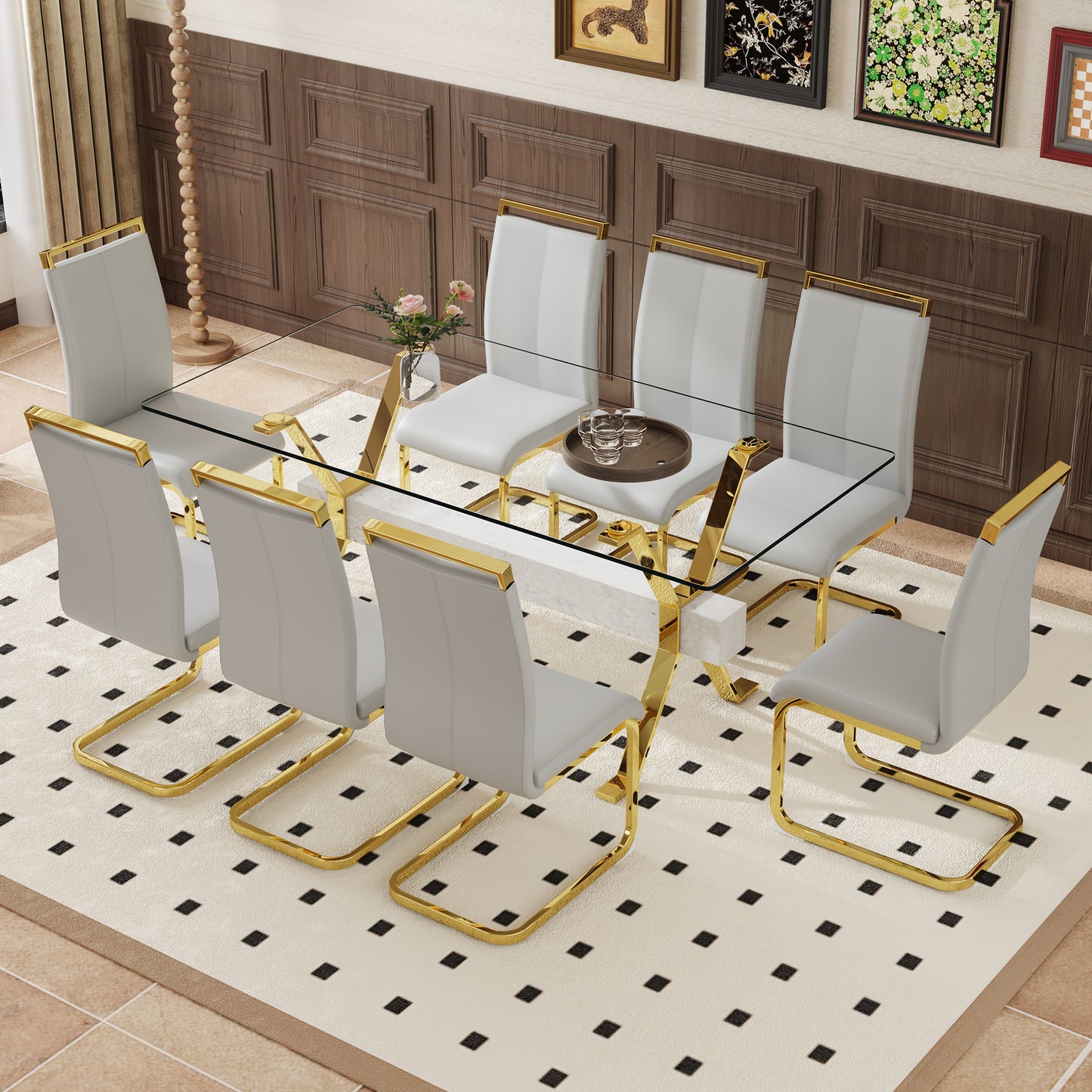 Modern dining table with glass top and gold legs