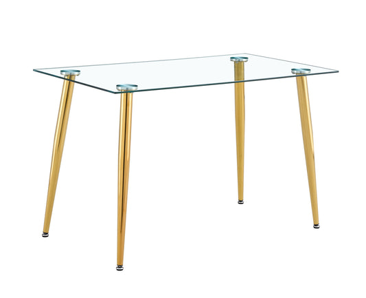 Glass top dining table with polished gold legs